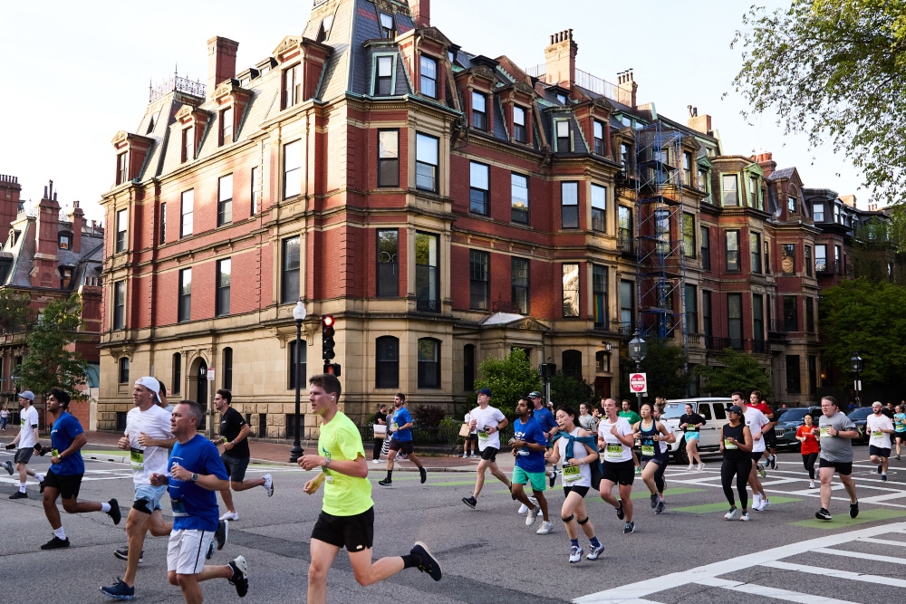 A group of participants from Boston race