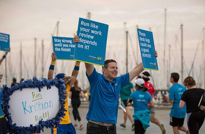 Supporters of the JPM Corporate Challenge San Francisco cheer the racers on.